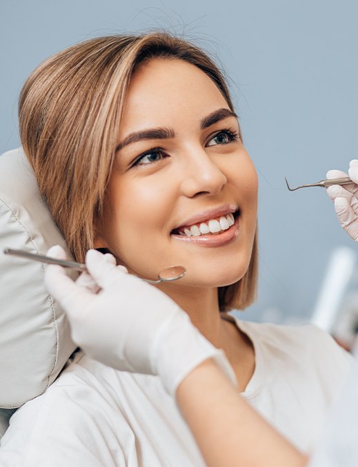 Woman receiving periodontal treatment