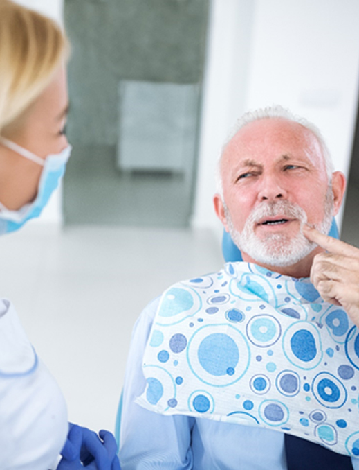 Man visiting his periodontist for dental implant salvage in Bethel Park 