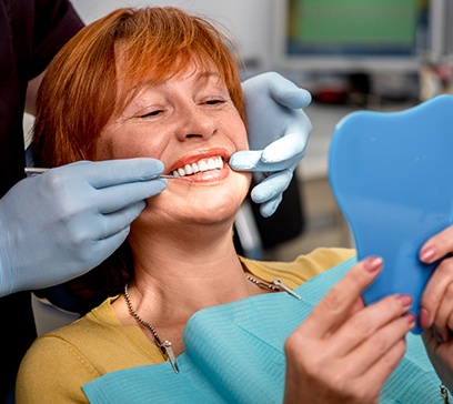 Woman receiving dental treatment