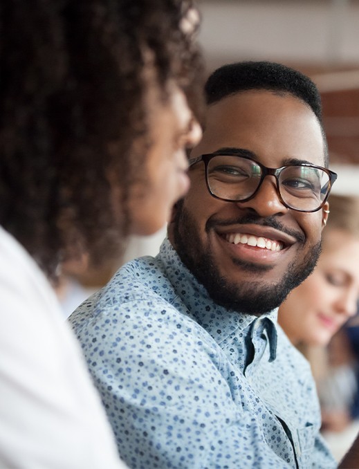 Man with healthy smile after periodontal therapy