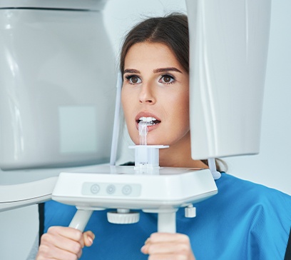 Woman receiving cone beam imaging